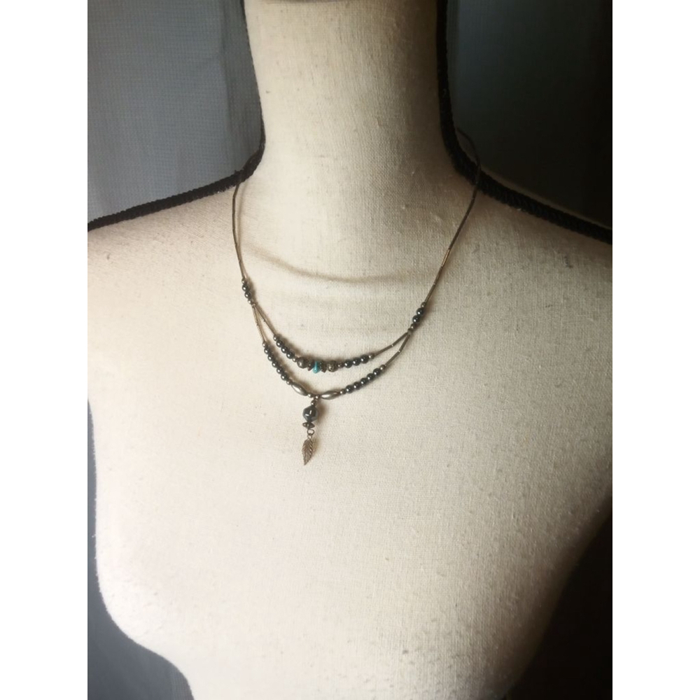 Necklace Black and Copper Beads with a Feather